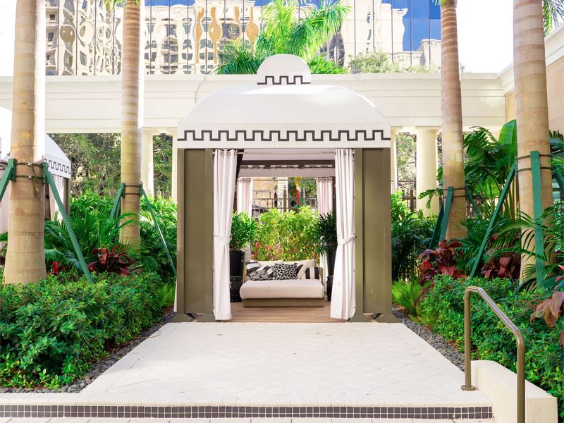 A Cornerstone stone pergola and hardscape entrance